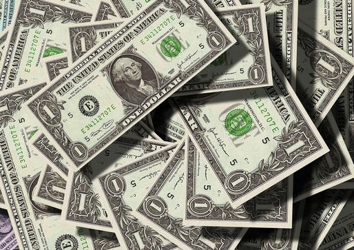 Dolarul a atins cel mai redus nivel din ultimele șapte luni din cauza tensiunilor geopolitice