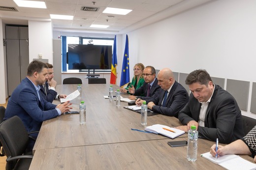 FOTO Bolojan, discuție pentru încălzirea mai bună a Bucureștiului