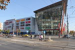 Liberty Center, preluat de bănci pe fondul crizei, se aliază cu Auchan pentru a-și îndeplini obiectivul de a atrage mai mulți locatari din zonă. Carrefour pleacă