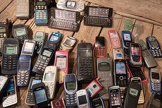 Fraudă de amploare cu telefoane mobile. Percheziții în 19 țări, inclusiv România