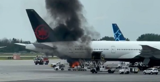 VIDEO O camionetă a luat foc sub un avion Air Canada