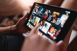 Acțiunile Netflix au scăzut din cauza planului de a nu mai publica datele privind abonații, din 2025