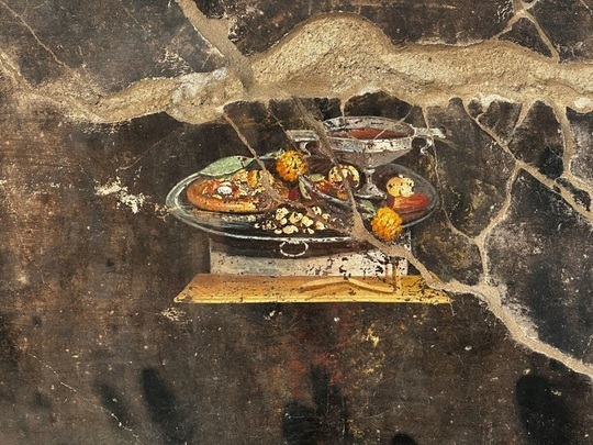 VIDEO&FOTO O frescă cu ceea ce ar putea fi o pizza, descoperită în ruinele antice romane de la Pompei