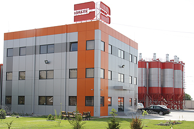 Undă verde - Saint-Gobain preia fabrica Duraziv, controlată de Daniel Guzu, cel mai mare producător independent de materiale de construcții din România