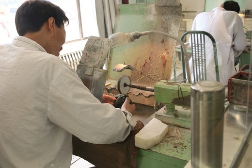 Producția din China s-a contractat pentru a treia lună consecutivă în decembrie