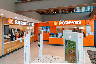 FOTO Premieră în România. Burger King și Popeyes deschid în București primul spațiu comun