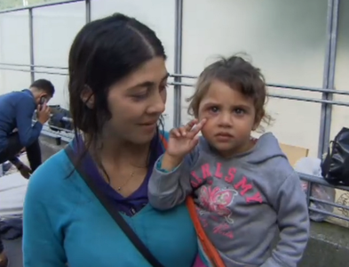 O româncă a fost amendată în Austria pentru că a cerşit cu un copil; cazul său ar putea duce la schimbarea legii