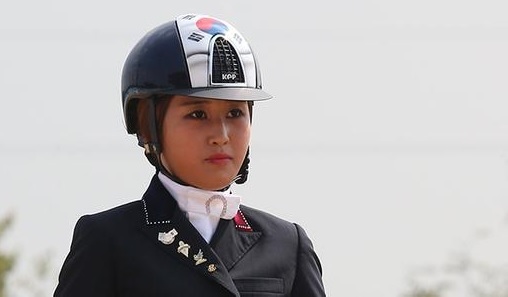 Autorităţile daneze au arestat-o pe fiica principalei suspecte în scandalul de corupţie din Coreea de Sud