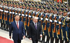 Putin şi Xi promit o nouă eră şi înfierează Statele Unite ale Americii. Totuşi, în delegaţia rusă a fost o absenţă notabilă: şeful Gazprom 