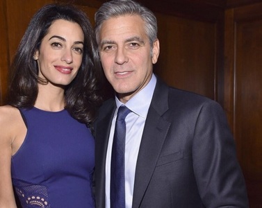 George Clooney şi soţia lui vor deveni părinţi de gemeni
