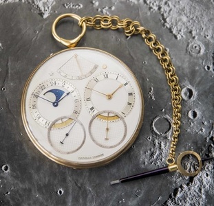 Un ceas de buzunar inspirat de aselenizare, vândut la Londra pentru o sumă record

