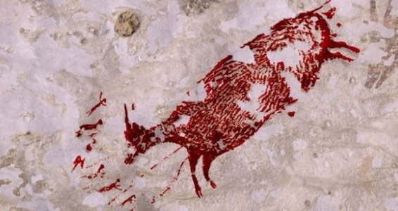 O pictură reprezentând o scenă de vânătoare, descoperită într-o peşteră din insula Sulawesi, ar putea fi cea mai veche "poveste rupestră" din lume