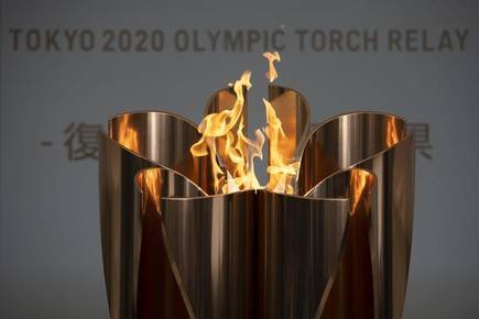 Flacăra Olimpică va rămâne aprinsă în Japonia, "ca o lumină de la capătul tunelului în care se află lumea astăzi"