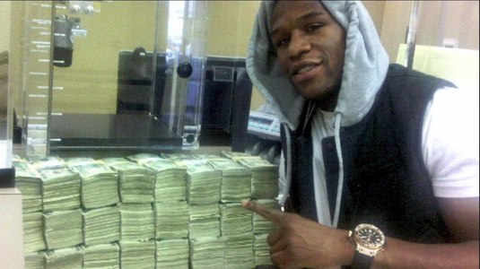 FOTO | Ce pariu nebun a putut să facă Mayweather! S-a dus la un meci de baschet şi nu s-a putut abţine: a mizat 25.000 de dolari pe loc