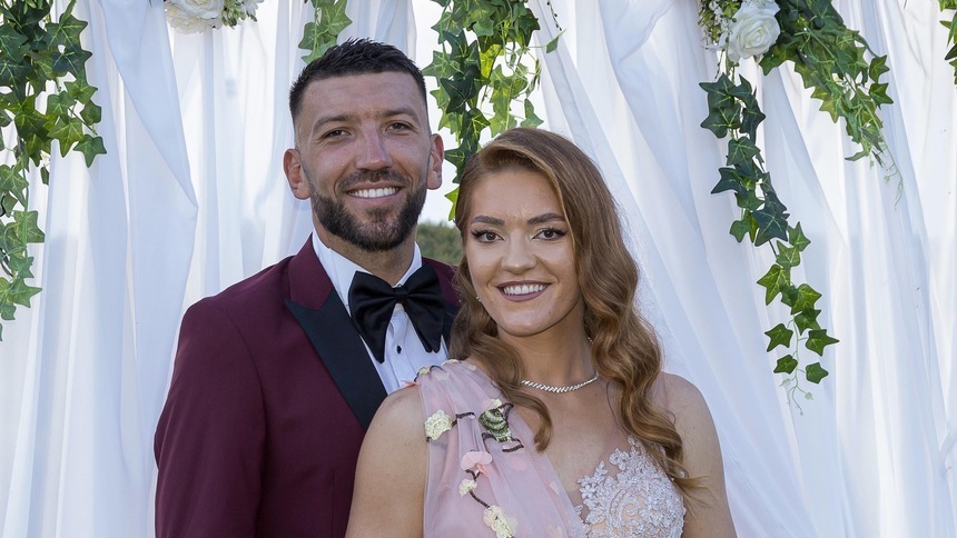 Canotorii Adriana Ailincăi şi Constantin Adam s-au căsătorit religios