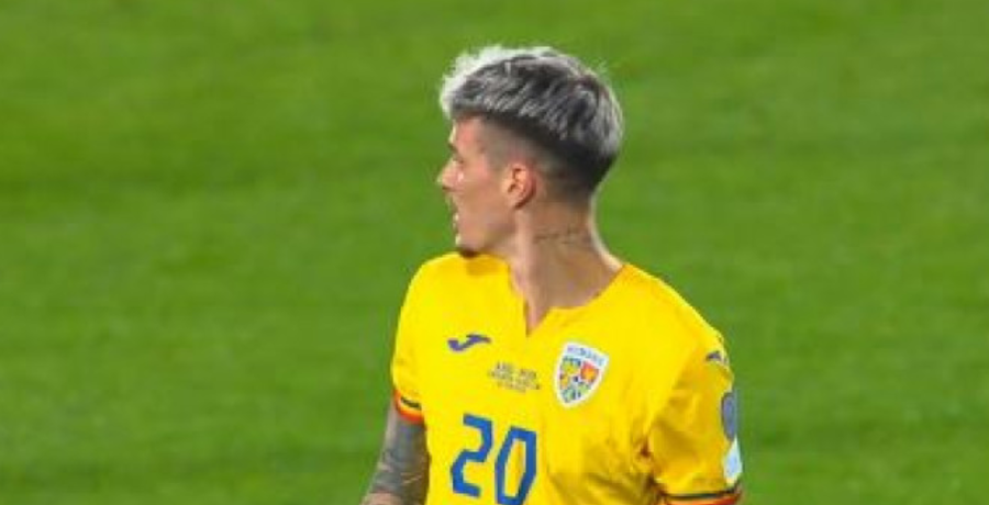 Denis Man, faultat dur de un adversar, la scurt timp după ce a marcat cu Andorra
