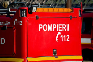 Incendiu într-un apartament din Slatina, peste 20 de locatari au fost evacuaţi. O femeie de 69 de ani a ajuns la spital cu arsuri