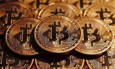 Bitcoin urcă, în premieră, peste pragul de 12.000 dolari. Capitalizarea criptomonedei a depășit 200 miliarde dolari