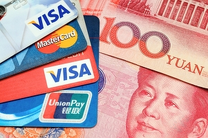 China introduce un plafon de 15.400 de dolari pe an pentru retragerile de numerar din străinătate