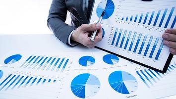 Analiștii CFA România estimează deprecierea leului și majorarea dobânzilor în următoarele 12 luni