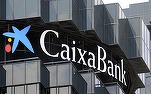 Caixabank și Bankia formează cel mai mare grup bancar spaniol, cu active de 650 de miliarde de dolari