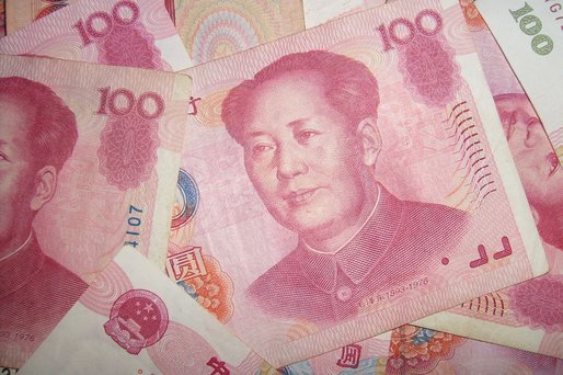 Banca centrală a Chinei reduce două dobânzi-cheie la minime record