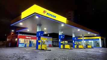 Auchan extinde rețeaua de magazine din stațiile Petrom