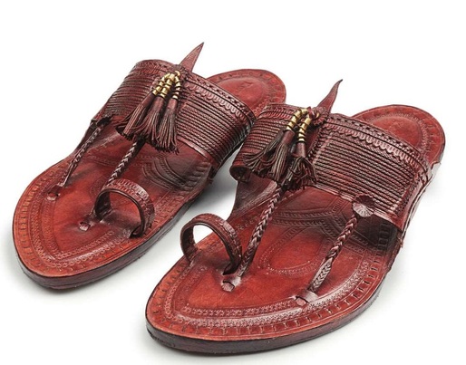 Scandal: Prada, acuzată că a copiat designul unor sandale de doar 12 dolari