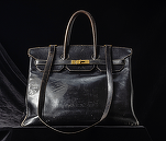 Singapore în cel mai mare caz de spălare de bani din istoria țării. Vinde genți Hermès și lingouri de aur confiscate 