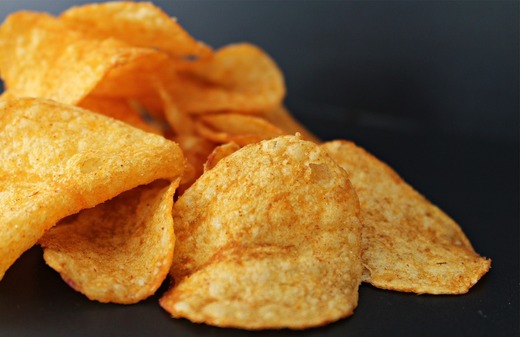 Cartel al chipsurilor și pop-cornului, destructurat. Trei societăți din Italia amendate cu 23,3 milioane euro
