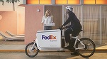 FedEx închide birouri și parchează mai multe avioane