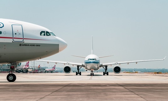IATA revizuiește în creștere estimările de profit pentru industria aeriană
