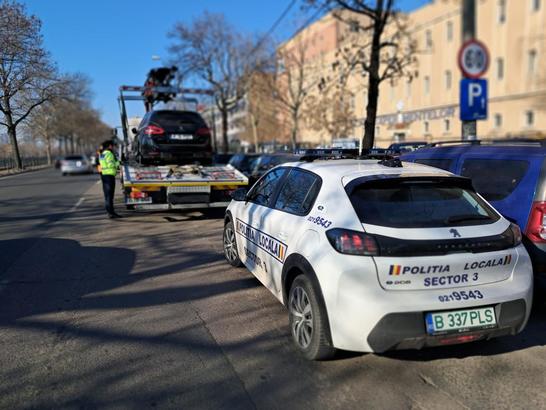 Înșelătorie în parcare - Șoferii bucureșteni, direcționați pentru plată cu stickere QR false. Percheziții declanșate de poliție