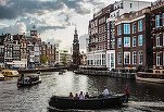 Orașul Amsterdam interzice închirierea spațiilor de cazare din centrul vechi, inclusiv prin platforma Airbnb, de la 1 iulie