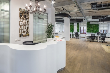 Studiu: 90% dintre companii aleg birourile open space