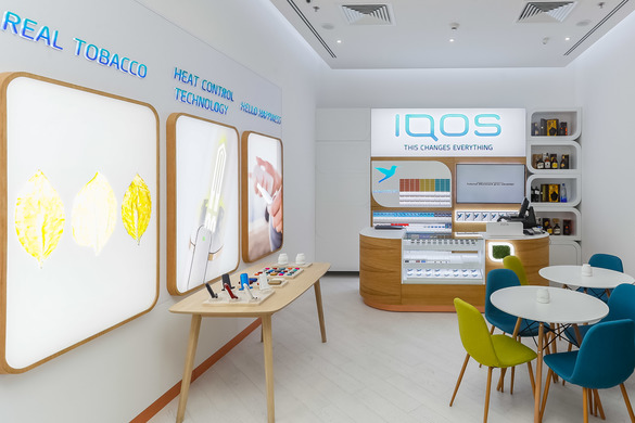 FOTO Philip Morris a inaugurat al doilea magazin pentru fanii țigărilor electronice IQOS din România, țară în care le va și produce