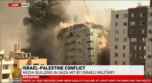VIDEO Imobilul care găzduia postul Al-Jazeera și birourile agenției americane de informații AP din Gaza, pulverizat de un atac