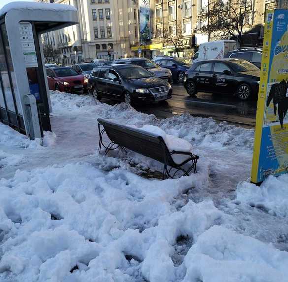 Bucureștiul sub zăpadă. Plouă cu amenzi FOTO