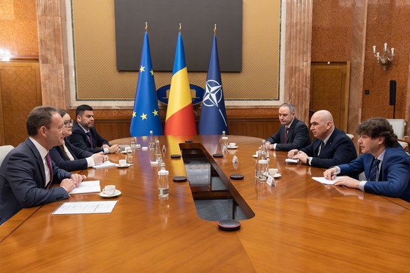 FOTO Bolojan și Nazare au discutat cu reprezentanții agenției Fitch, care va actualiza în curând ratingul României 