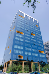 The One a închiriat către Ford etajul 18 din One Tower. Plan pentru al doilea centru The One