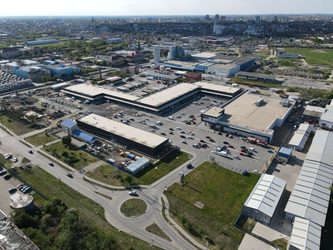 Tranzacție - Grupul polonez Scallier cumpără peste 3 hectare de teren de la producătorul băuturilor Alexandrion și Cava D’Oro pentru Funshop Park Ploiești 