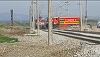 Cluj: Autospecială a pompierilor, filmată în timp ce trece razant prin faţa unui tren, riscând un accident / O tragedie a fost evitată la limită, trenul oprind / Oficialii ISU Cluj anunţă cercetare disciplinară - VIDEO