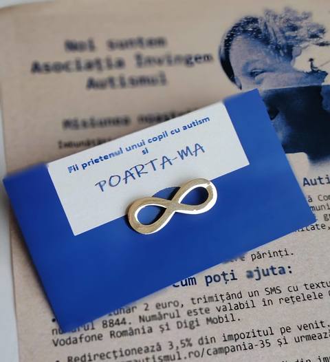 De Ziua Internaţională a Conştientizării Autismului, Asociaţia ”Învingem Autismul” lansează campania „Poartă-mă în Aprilie”: Purtarea pinului infinitul auriu, simbolul autismului, devine o declaraţie de empatie 

