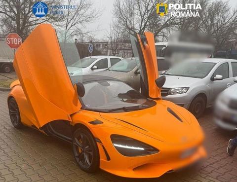 Un francez şi un belgian care controlau o societate comercială din Capitală, acuzaţi că au importat ilegal maşini de lux provenite din infracţiuni, în valoare de peste 1,2 milioane de euro/ Străinii, plasaţi sub control judiciar - FOTO