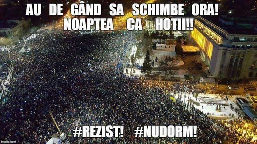 Dragnea postează pe Facebook o imagine de la protestele faţă de OUG 13, cu un mesaj ironic legat de trecerea la ora de vară - ”noaptea ca hoţii”