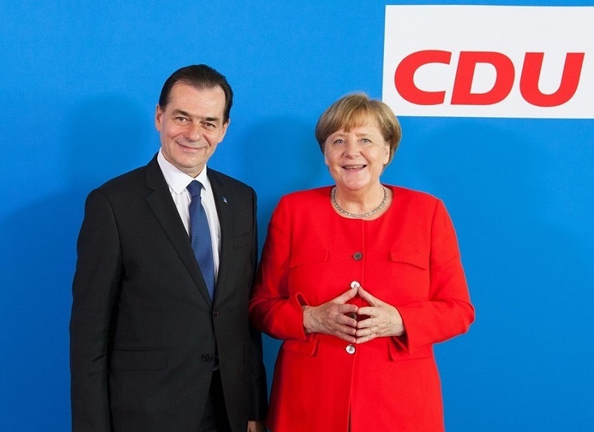 Ludovic Orban, convorbire telefonică cu Angela Merkel, la iniţiativa acesteia/ Cei doi au discutat, printre altele, despre situaţia muncitorilor români sezonieri