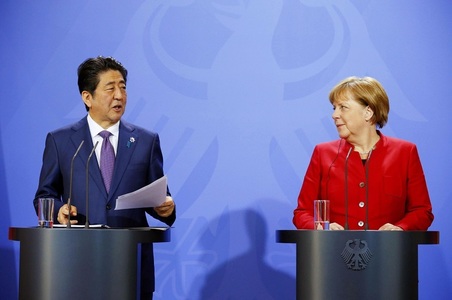 Merkel şi Abe cer eforturi concertate pentru apărarea libertăţii comerţului