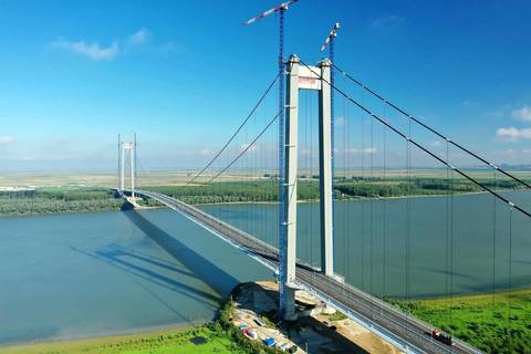 Constructorul italian WeBuild nu a reuşit să blocheze nici în Italia executarea de către CNAIR a garanţiei aferente întârzierilor înregistrate la construcţia podului suspendat de la Brăila

