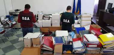 Percheziţii în Bucureşti, Vâlcea şi Argeş la persoane suspectate de fapte de corupţie; un fost primar este vizat, fiind suspectat că ar fi folosit acte false pentru stingerea unor datorii şi pentru decontarea unor lucrări neefectuate