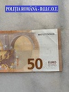 Percheziţii în Hunedoara pentru destructurarea unei reţele care plasa bani falşi pe piaţă
